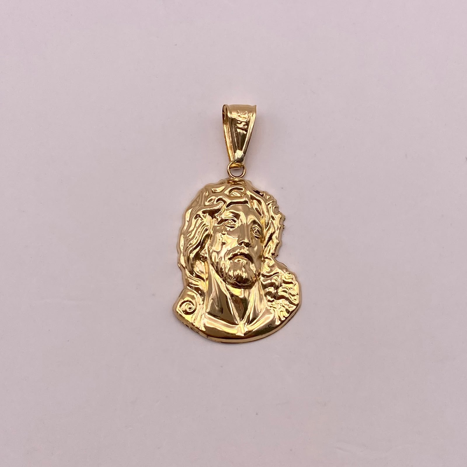 Dije rostro cristo Oro amarillo 18k 1,14 Gr / 13,3 mm / 2,7 Cm