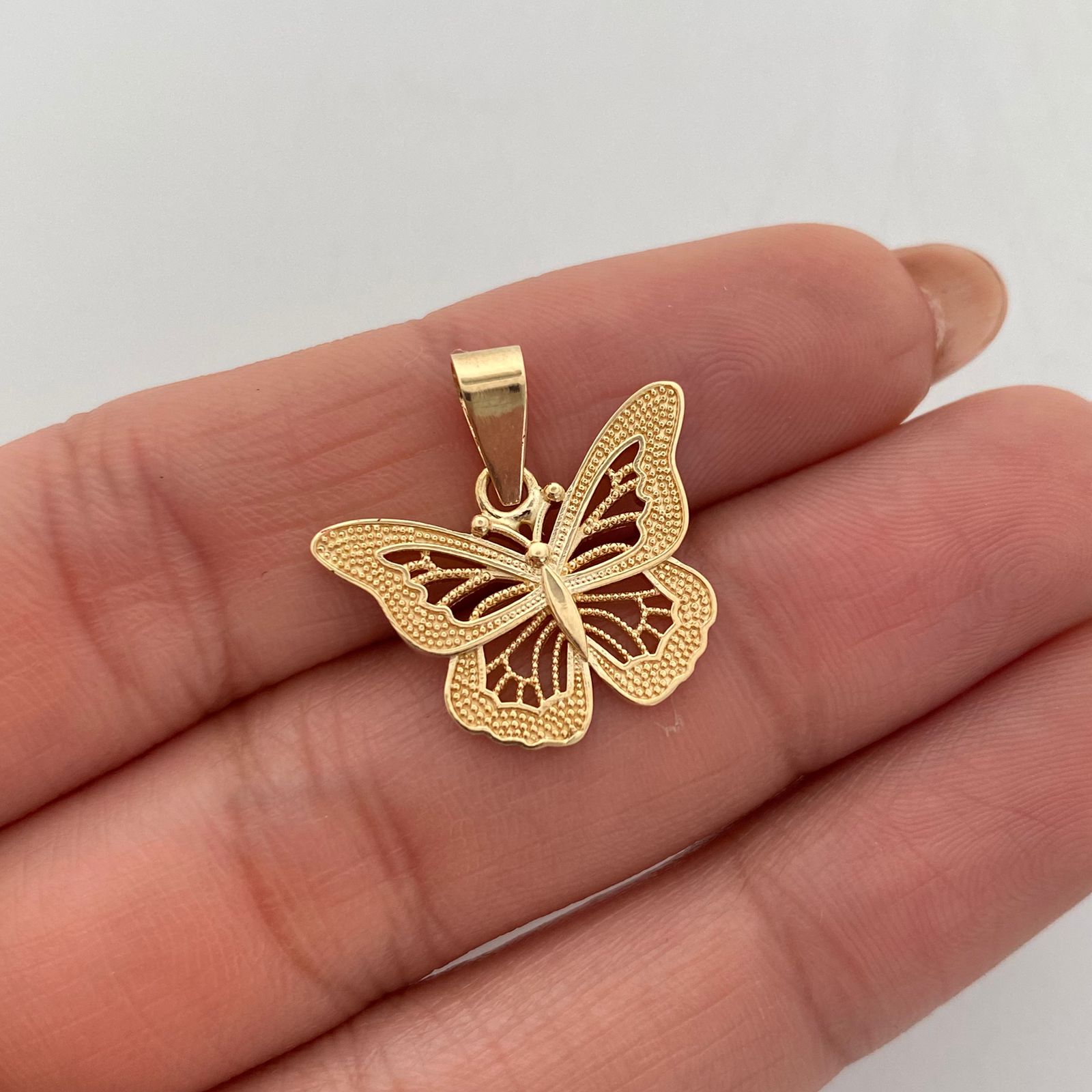 Dije mariposa (POR FABRICACION)  Oro amarillo 18k 4 Gr / 17,8 mm / 2,6 Cm