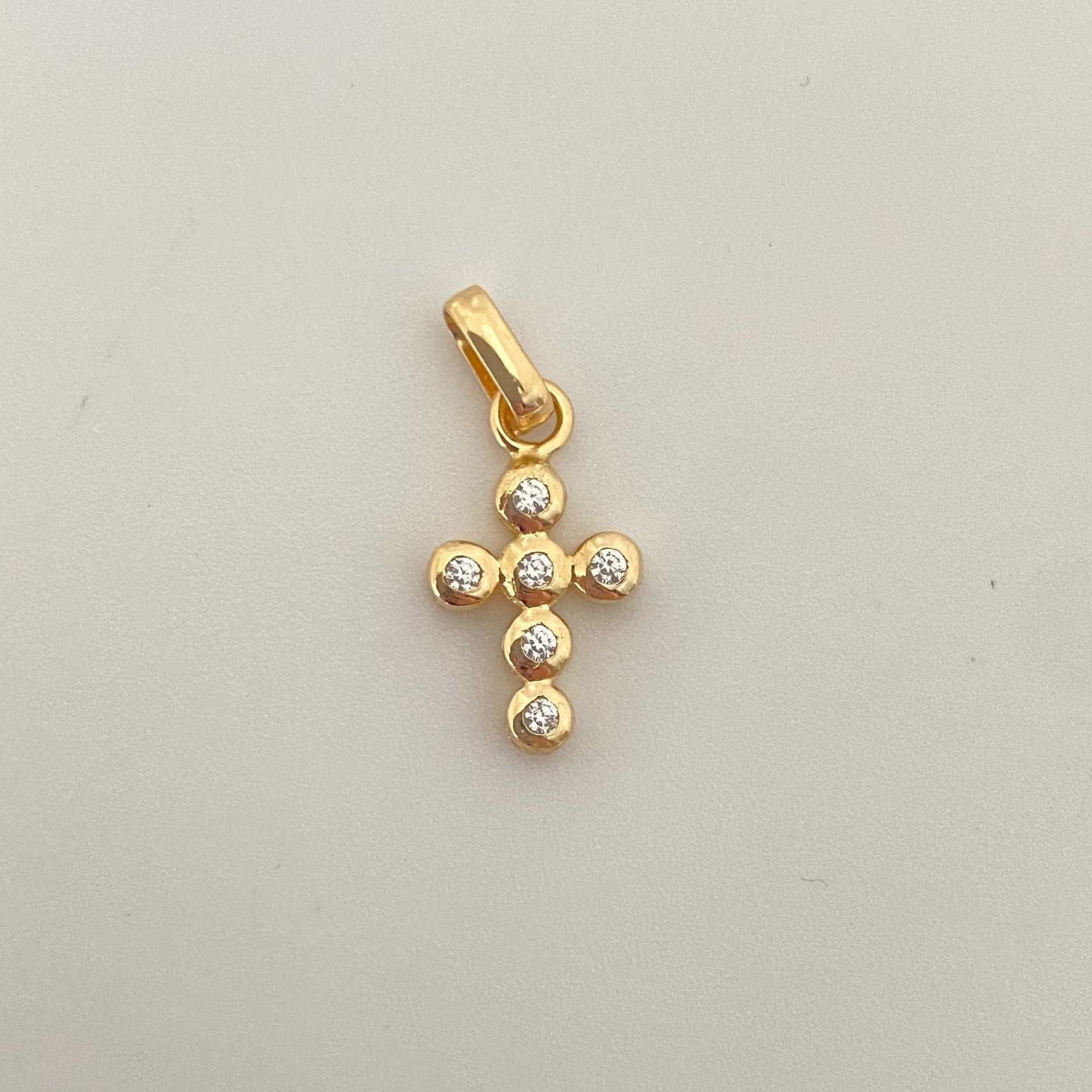 Dije cruz bolitas circones Oro amarillo 18k 1,10 Gr / 2,0 Cm