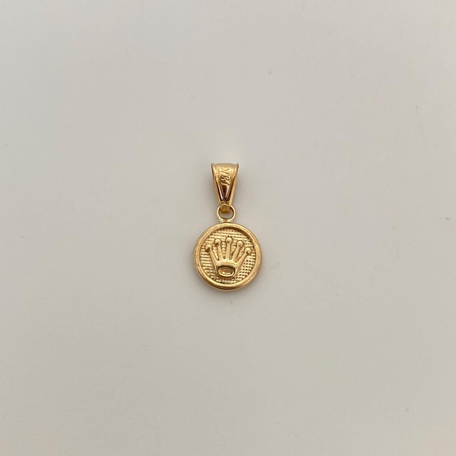 Dije Corona Rx Oro amarillo 18k 0,65 Gr / 10,2 mm / 2 Cm