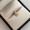 Dije Oso Mano Alzada Oro amarillo 18k 0,35 Gr / 6,1 mm / 1 Cm