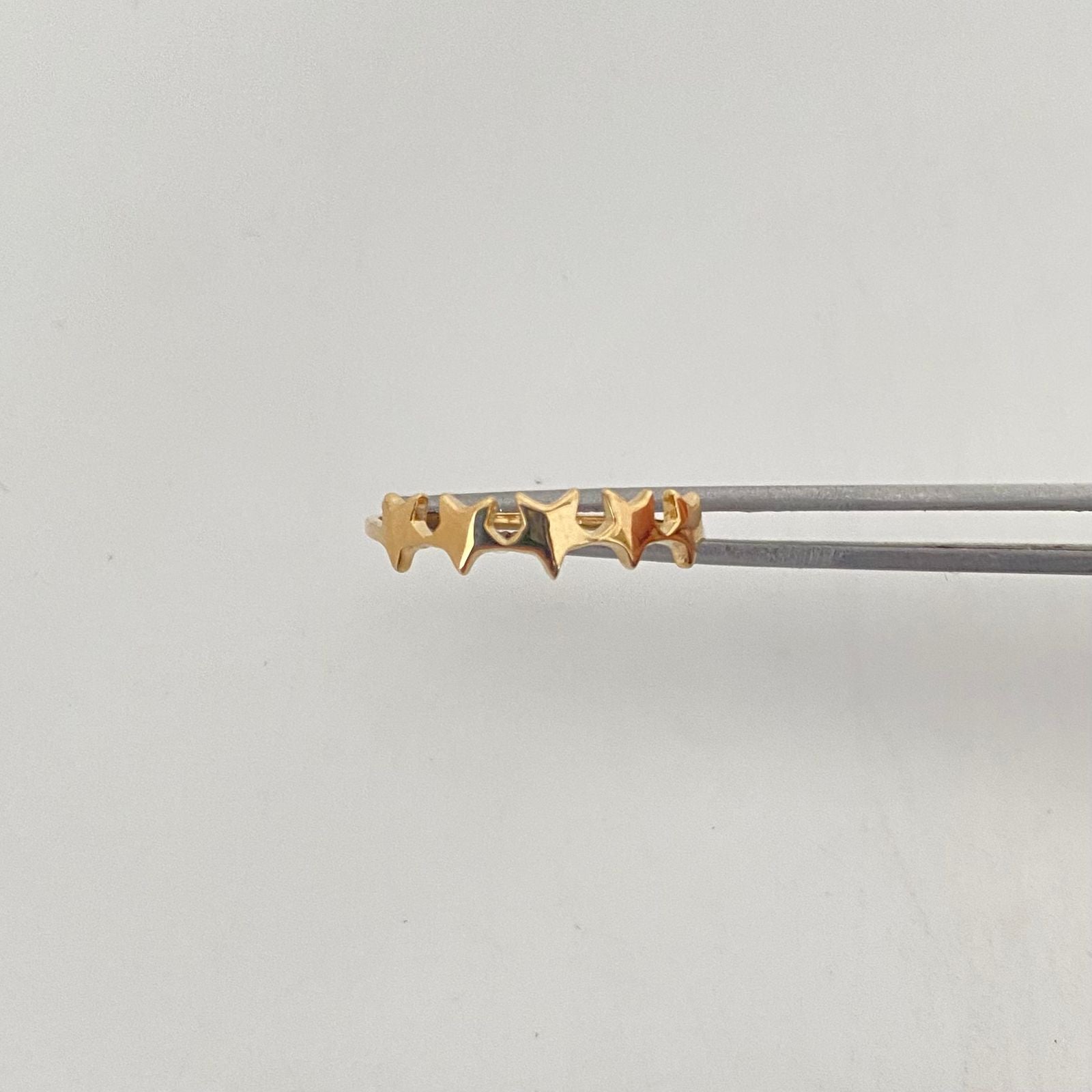 Anillo estrellas seguidas  Oro amarillo 18k / Talla 7 / 0,95 Gr