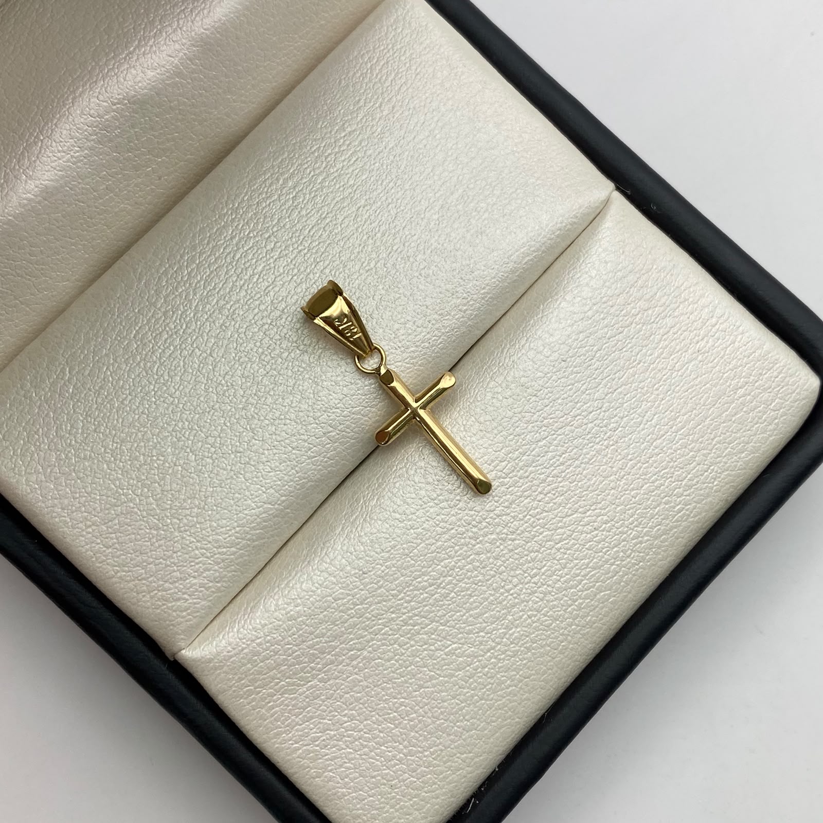 Dije cruz lisa Oro amarillo 18k 0,4 Gr / 9,5 mm / 2,5 Cm