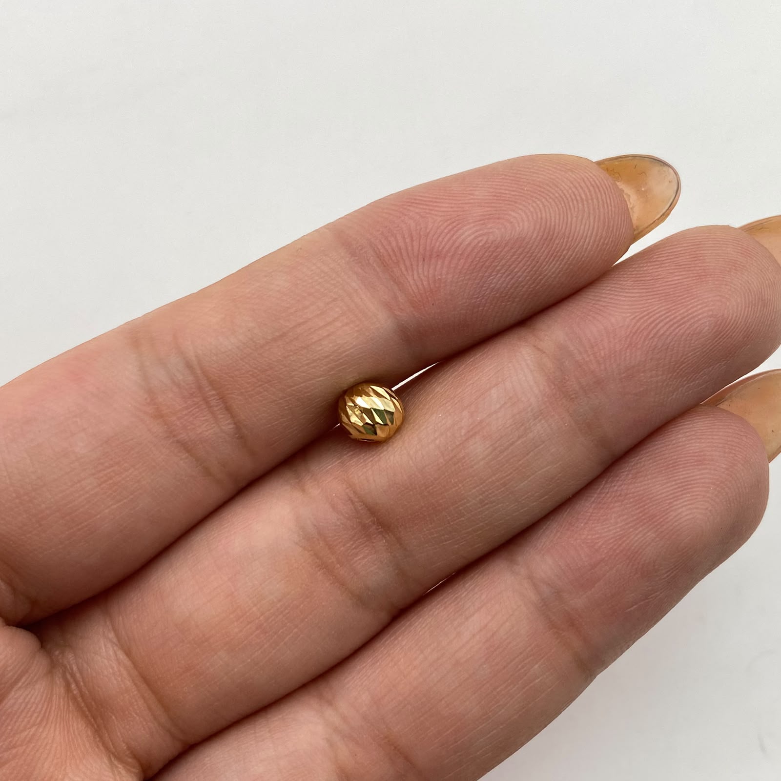 Bola Diamantada 6mm Oro amarillo 18k 0,15 Gr