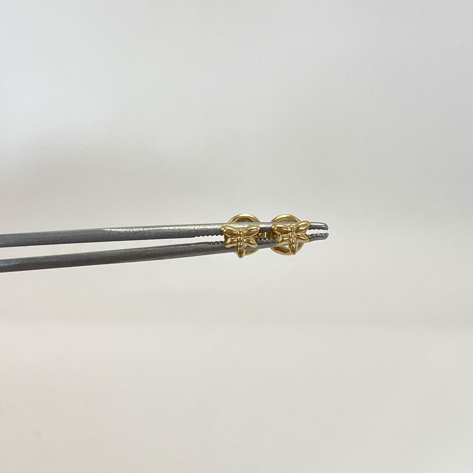 Topos mini mariposa Oro amarillo 18k 0,45 Gr / 5,1 mm