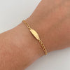 Pulso bebé Placa ovalada Oro amarillo 18k 1,60 Gr / 2,8 mm / 15 Cm Broche 0,30