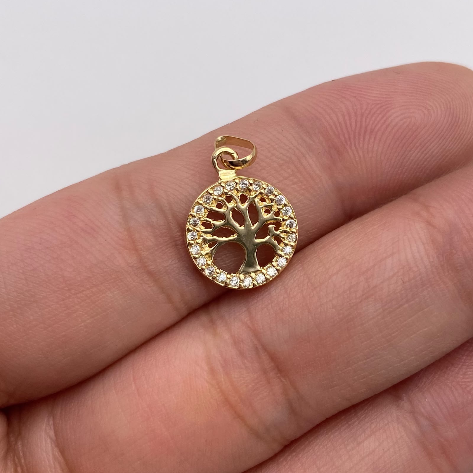 Dije arbol circones blancos Oro amarillo 18k 1,53 Gr / 11,7 mm / 1,8 Cm
