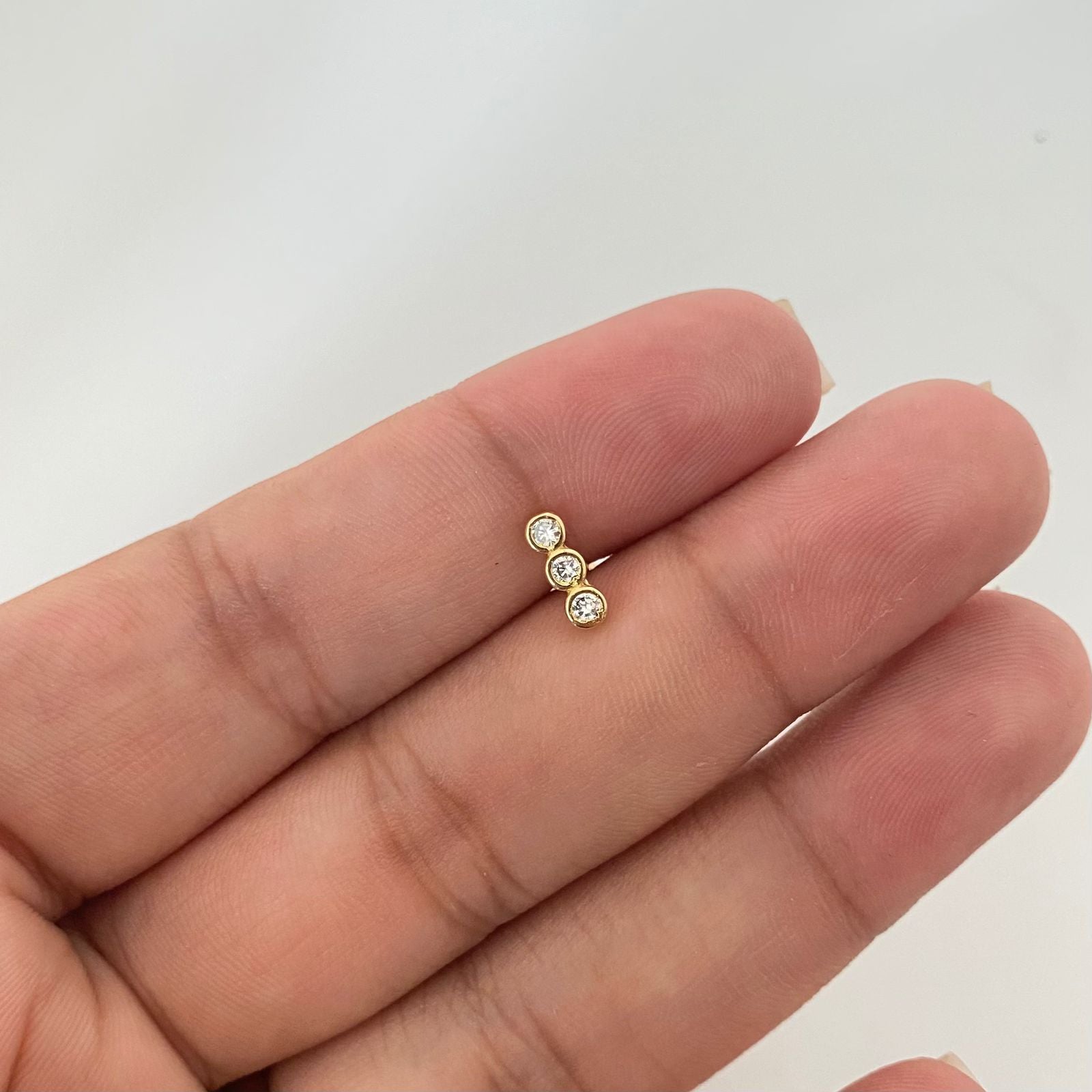 Piercing fila triple circon ( joya ) Oro amarillo 18k 0,7 Gr