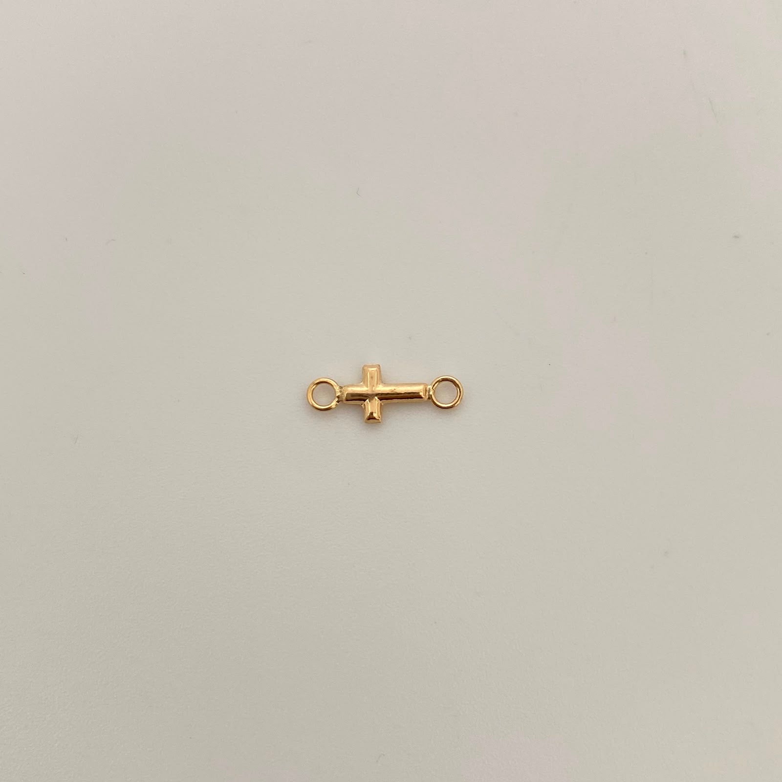 Herraje Mini Cruz Oro amarillo 18k 0,2 Gr / 1,4 Cm
