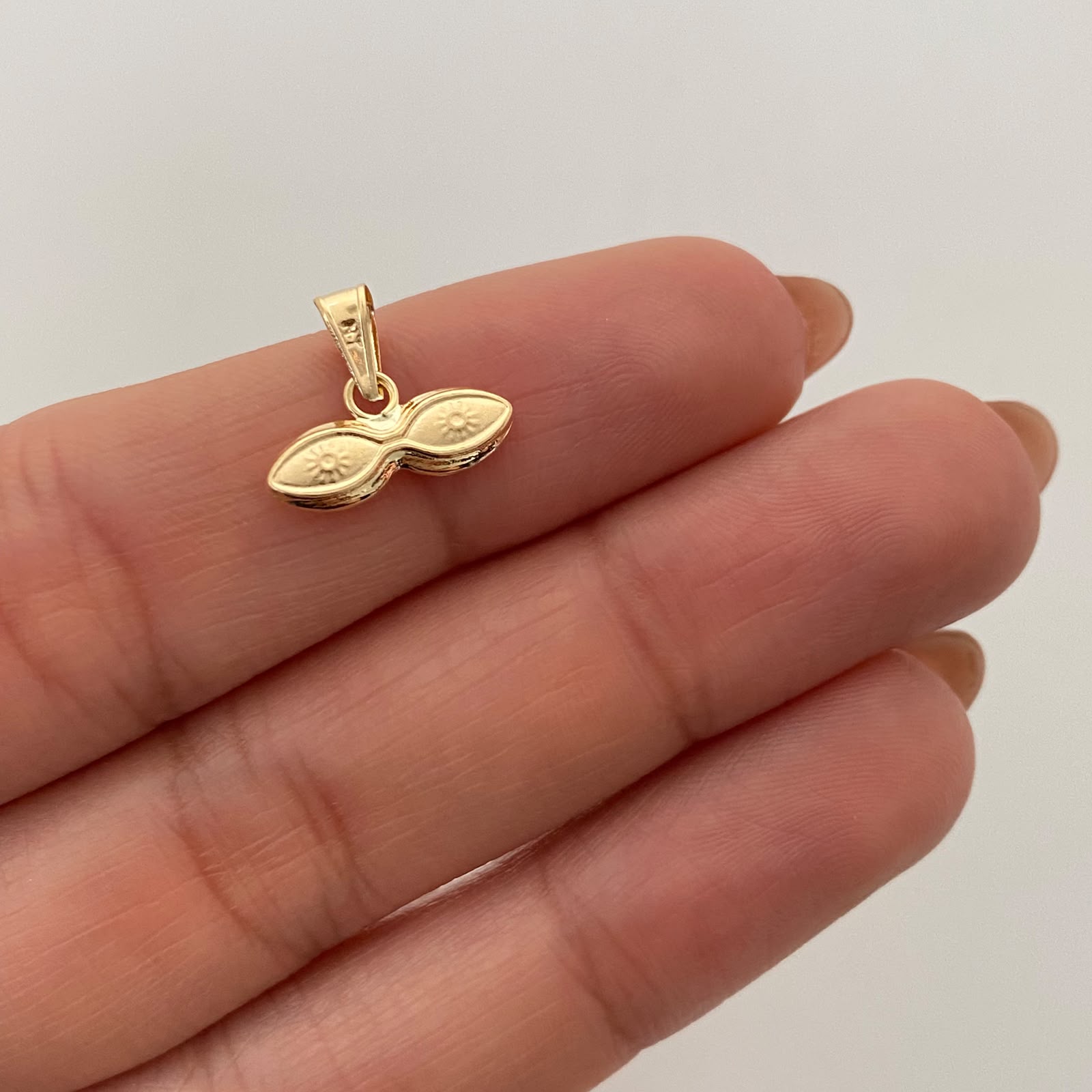 Dije Ojos de Santa Lucia Oro amarillo 18k 0,4 Gr / 13,8 mm / 1,1 Cm