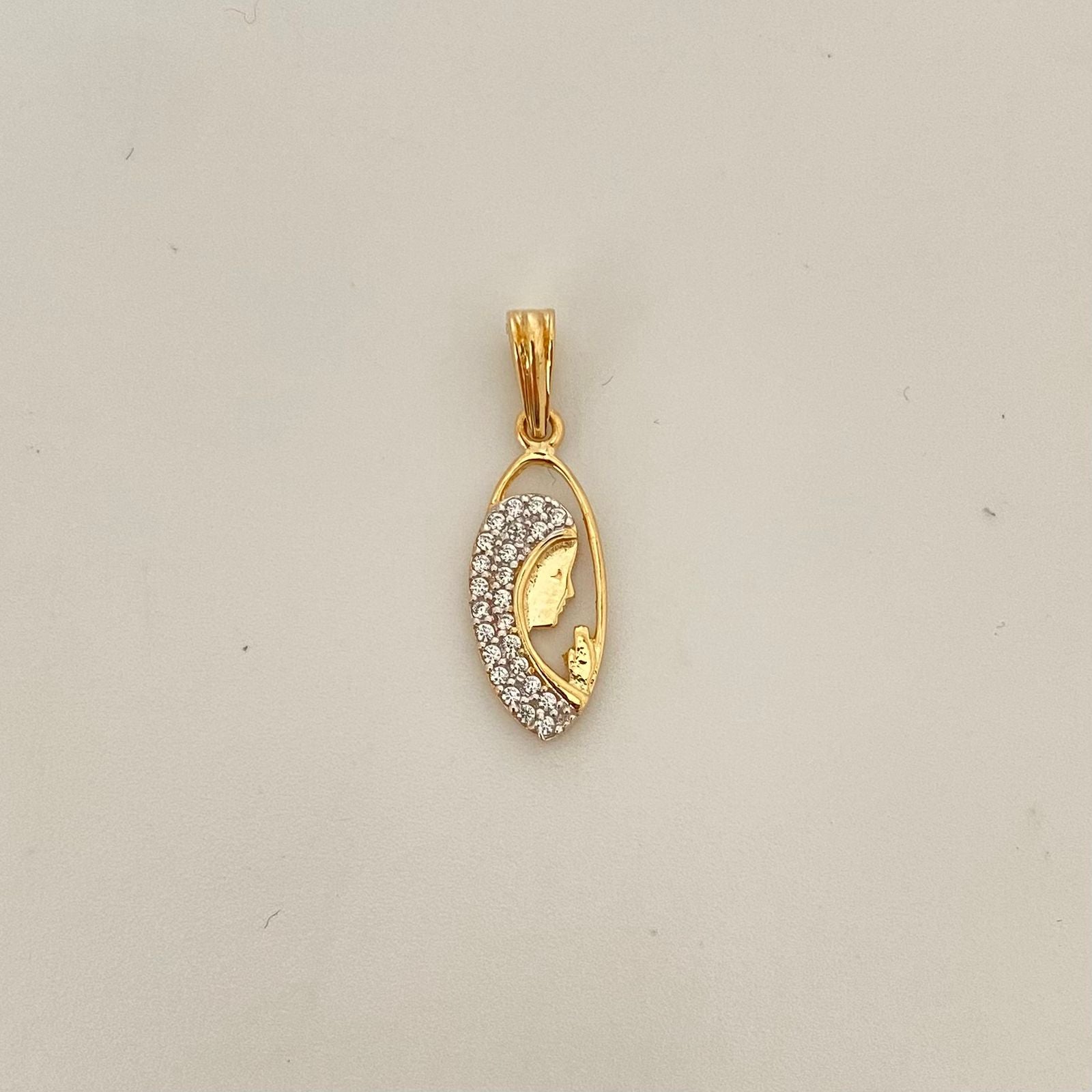Dije niña maria casting Oro amarillo y Oro blanco 18k 1,1 Gr / 2,5 Cm