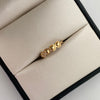 Anillo Fila Circulos Oro amarillo 18k / Talla 5 1/2 / 1 Gr / 1,4 mm