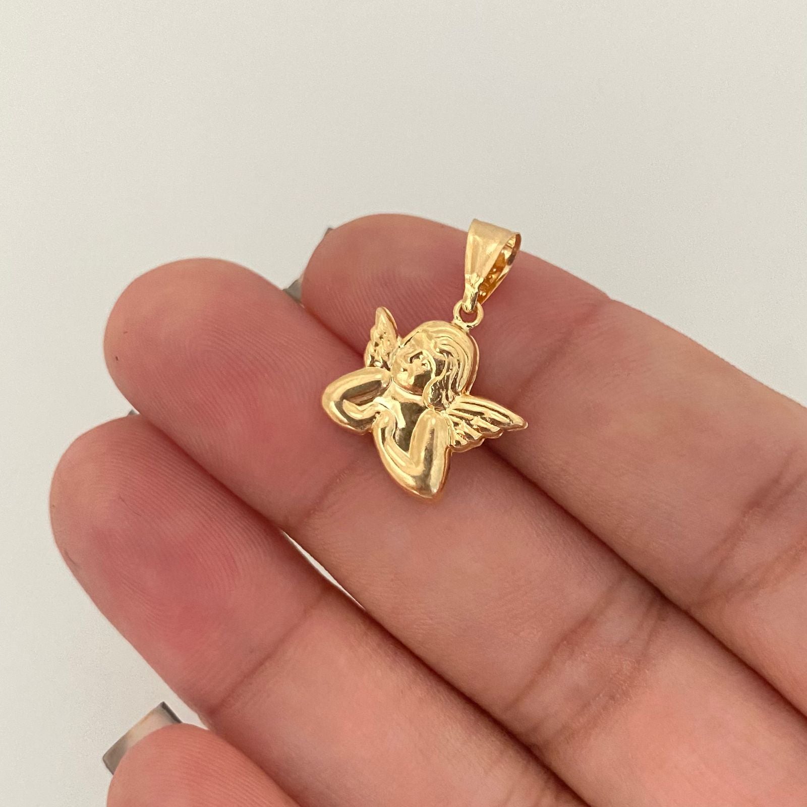 Dije angel orando Oro amarillo 18k 0,25 Gr / 1,5 Cm
