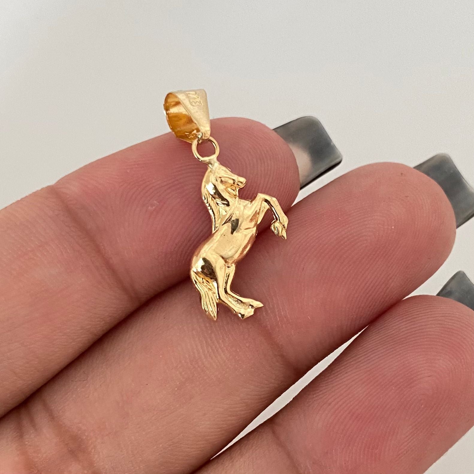 Dije caballo Oro amarillo 18k 0,65 Gr / 2,5 Cm