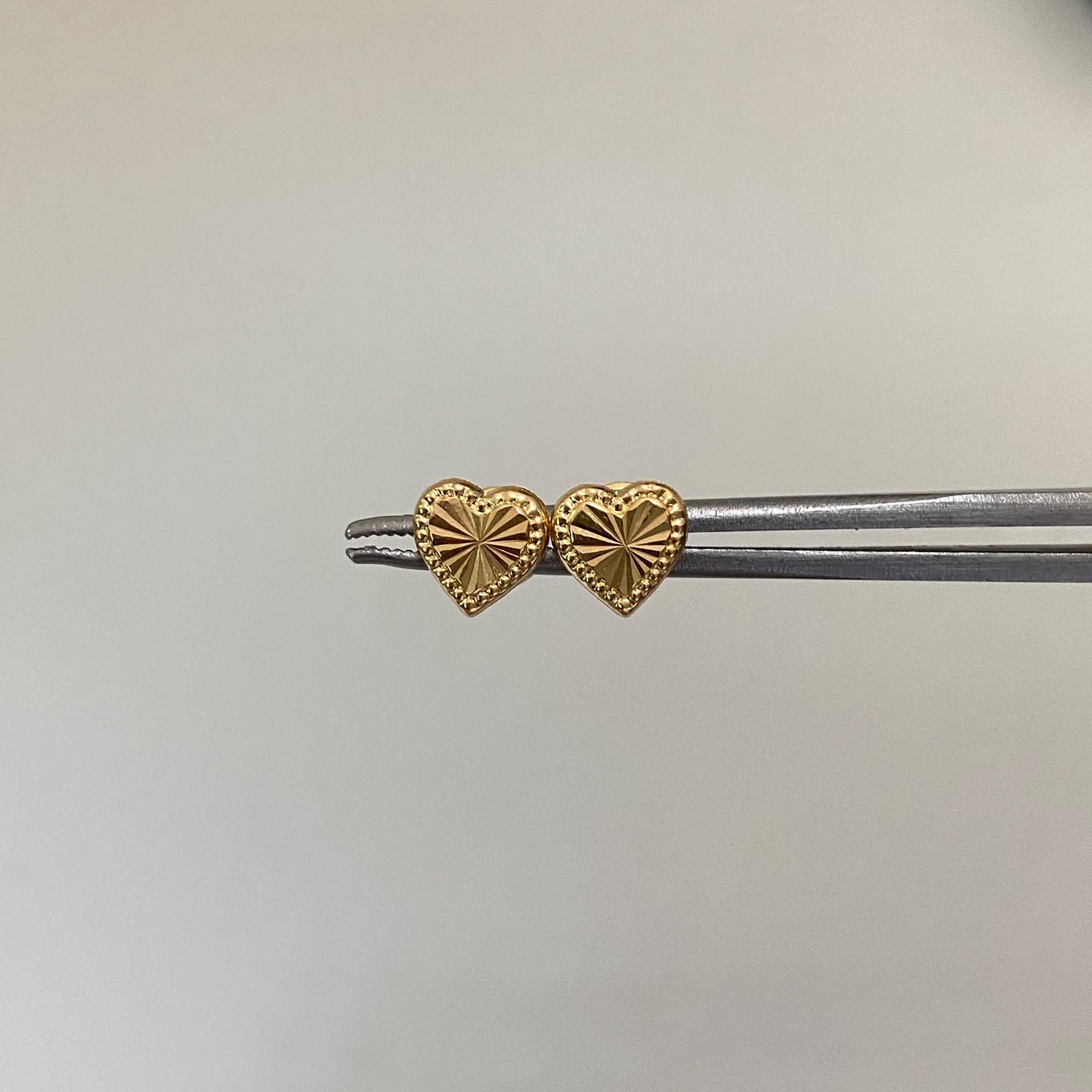 Topos corazon plano diamantado  Oro amarillo 18k 0,45 Gr / 7 mm