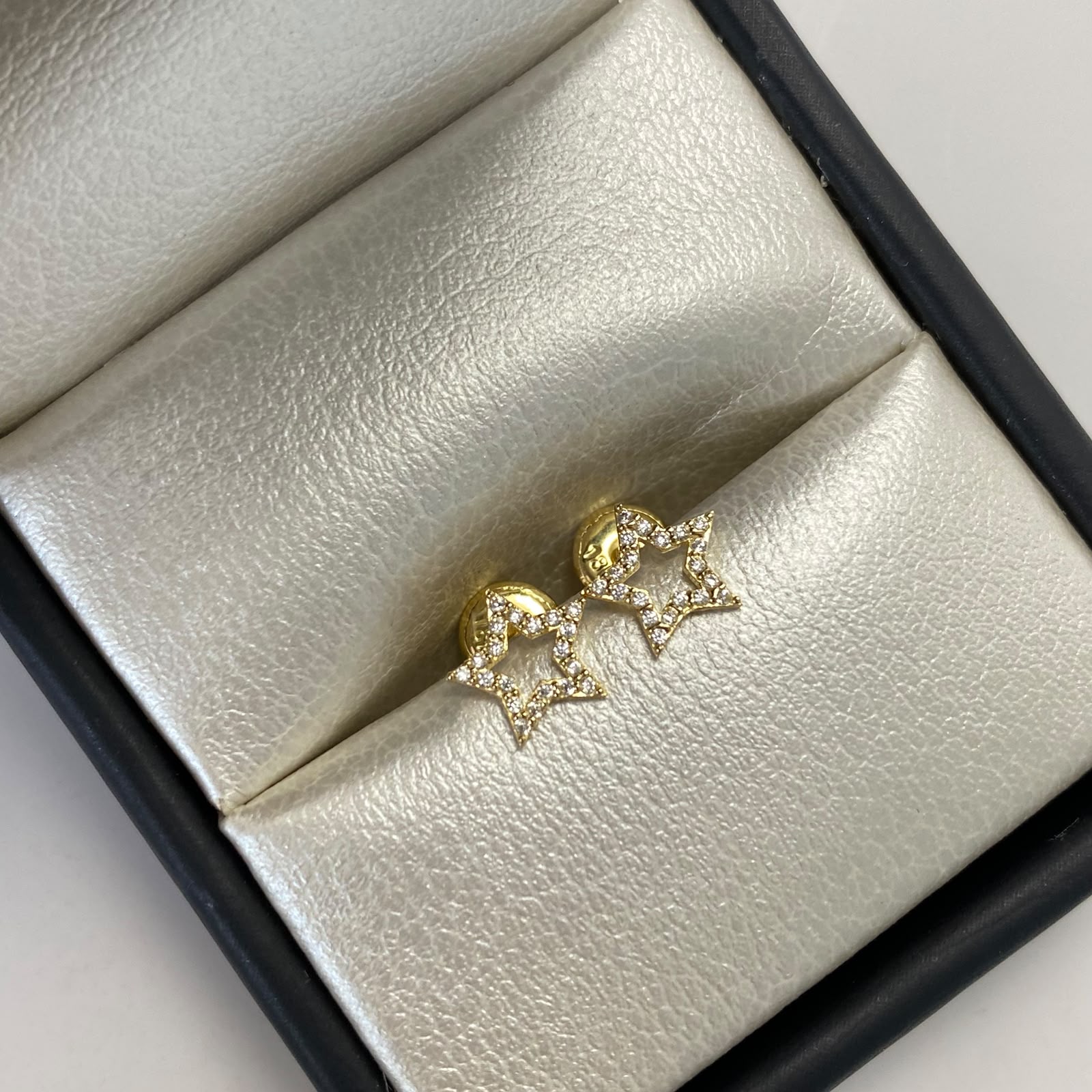 Topos silueta estrella circones blancos Oro amarillo 18k 0,8 Gr / 7,6 mm