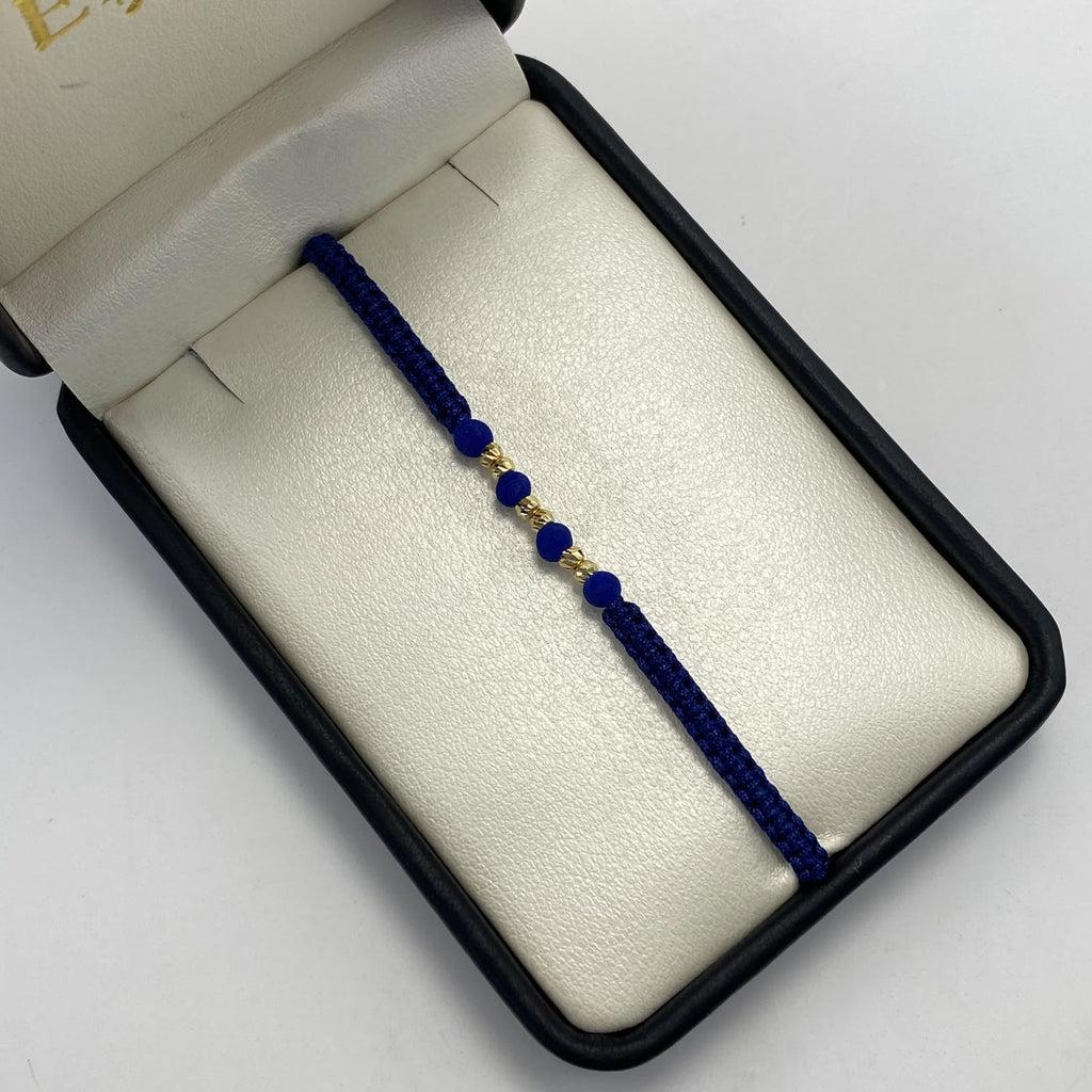 Pulsera tejida Bola 3mm hilo azul Oro amarillo 18k 0,2 Gr