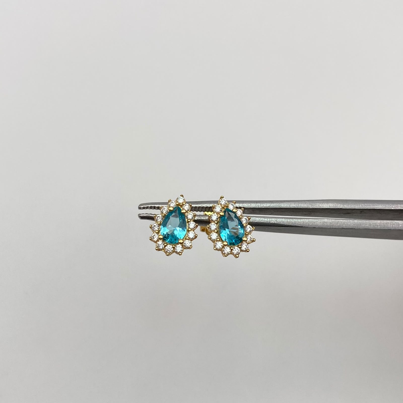 Topos gota circón aguamarina y blancos Oro amarillo 18k 1,7 Gr / 7,68 mm