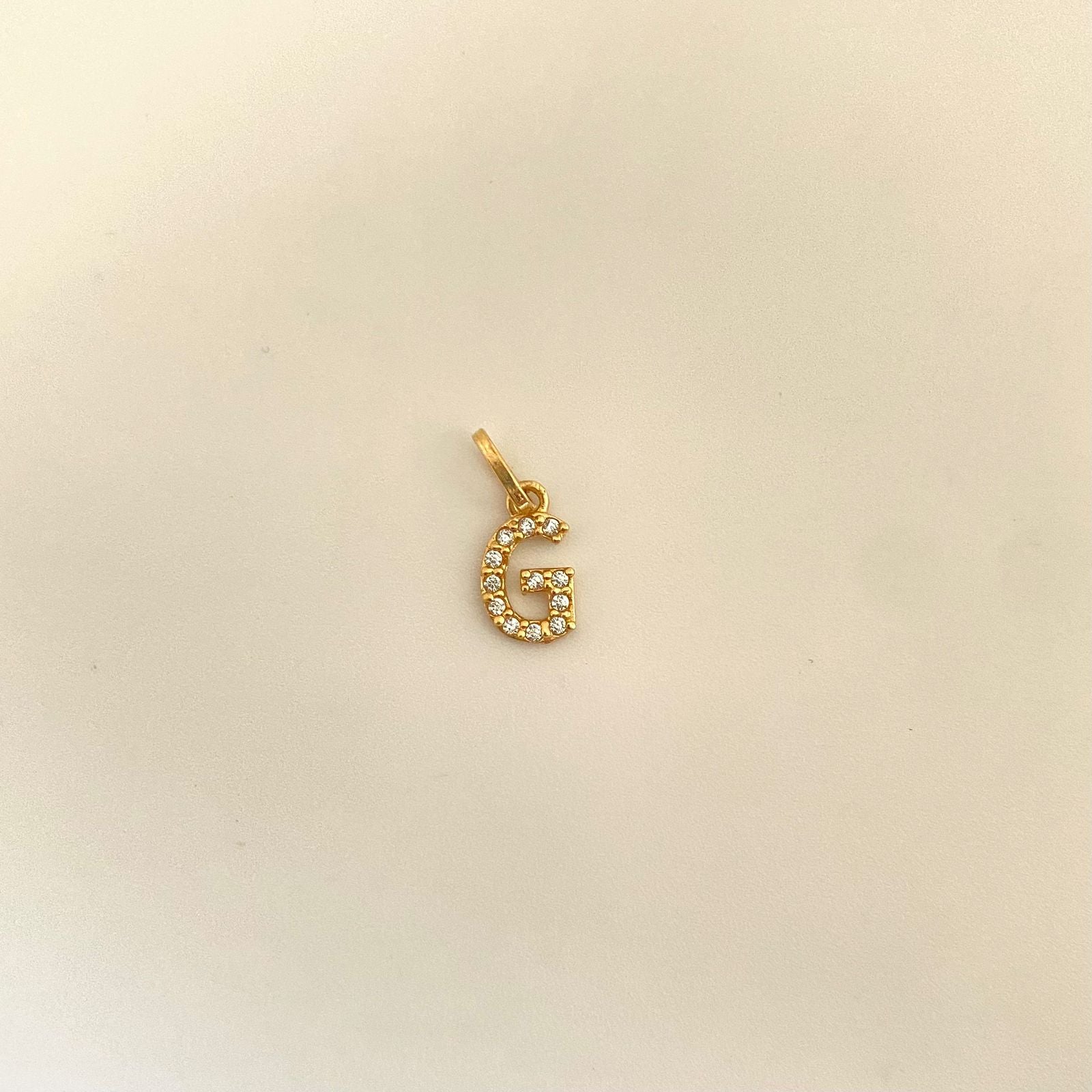 Dije letra G casting Oro amarillo 18k 0,4 Gr / 1,5 Cm