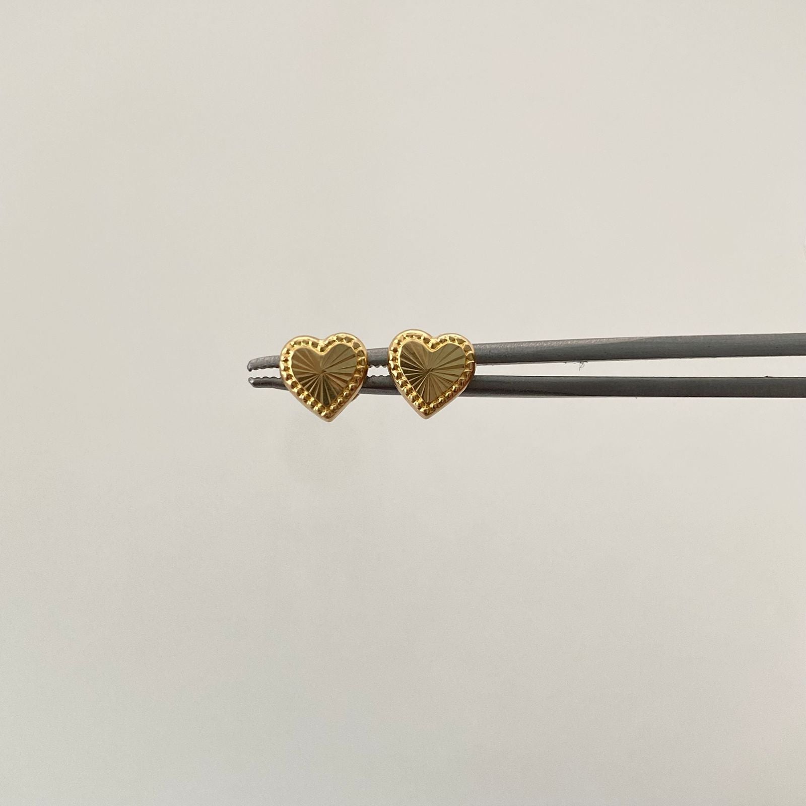 Topos Corazon fondo diamantado Oro amarillo 18k 0,7 Gr / 7 mm