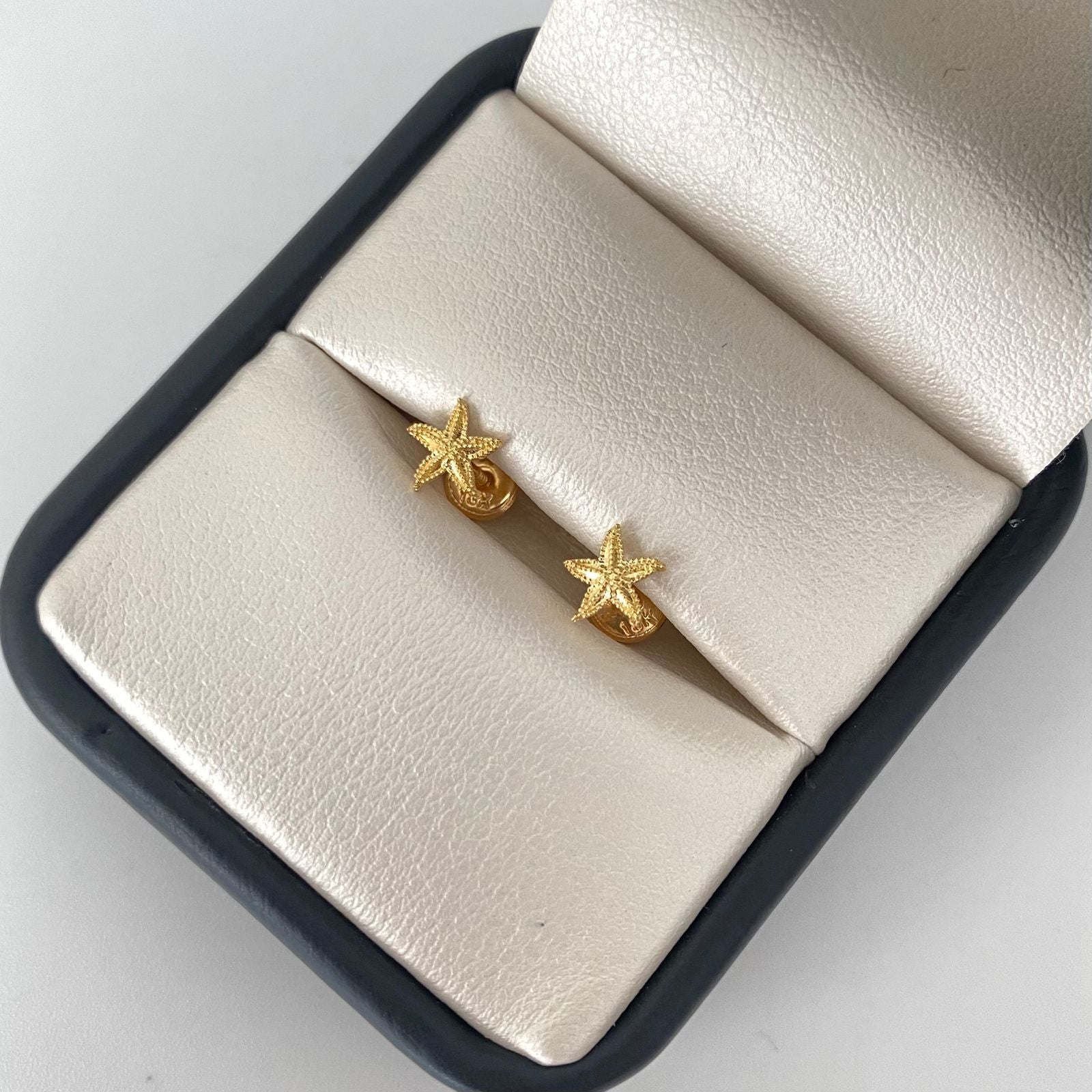 Topos estrella de mar Oro amarillo 18k 0,75 Gr / 6,3 mm