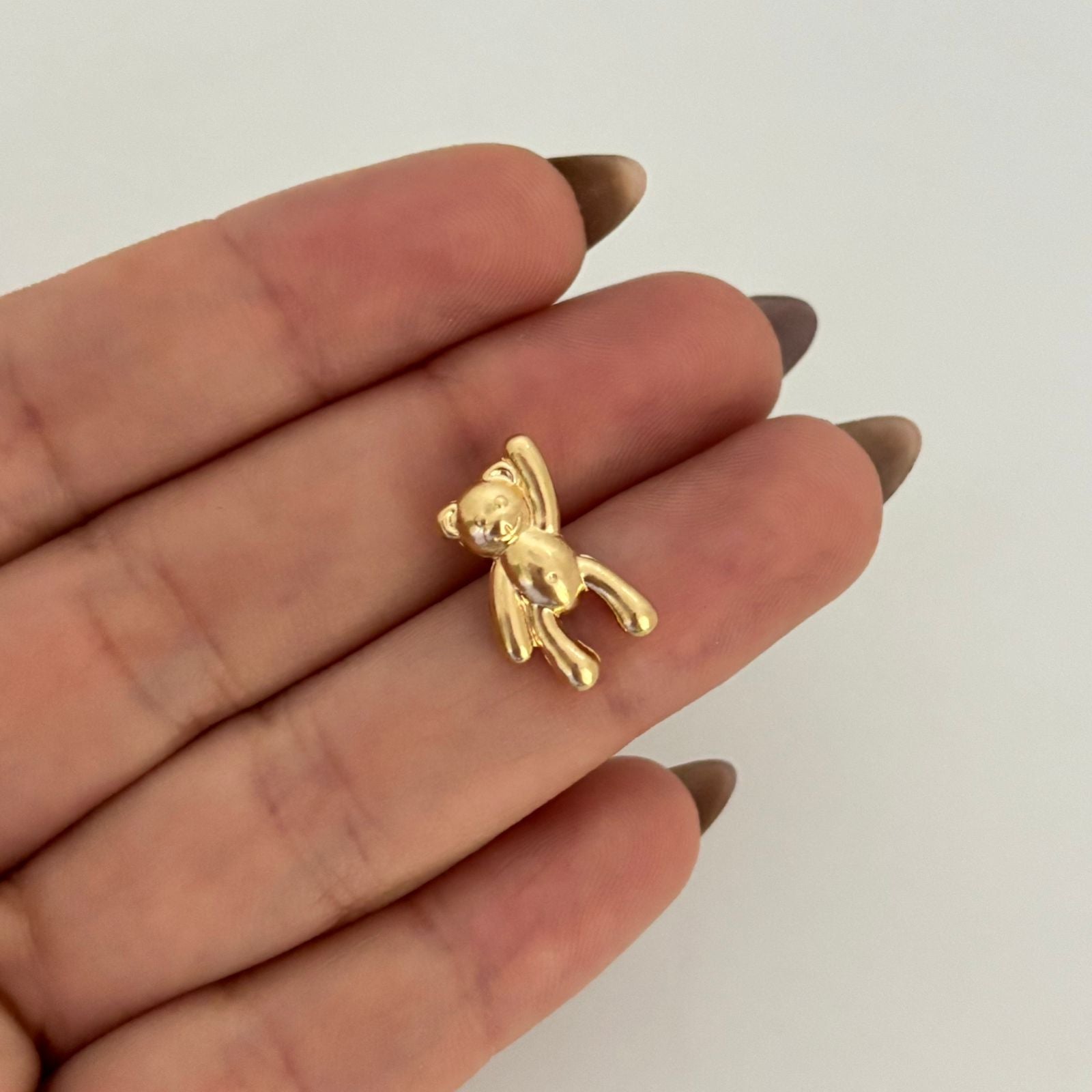 Dije oso mano alzada Oro amarillo 18k 0,9 Gr / 1,5 Cm