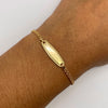 Pulso bebé aro seguido placa ovalo borde Oro amarillo 18k 1,33 Gr / 14,5 Cm  Broche 0,20
