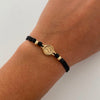 Pulsera tejida Signo peso bolas diamantada 4mm negro Oro amarillo 18k 0,75 Gr
