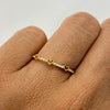 Anillo Corazon silueta fila de circones Oro amarillo 18k / Talla 6 / 1 Gr / 1 mm