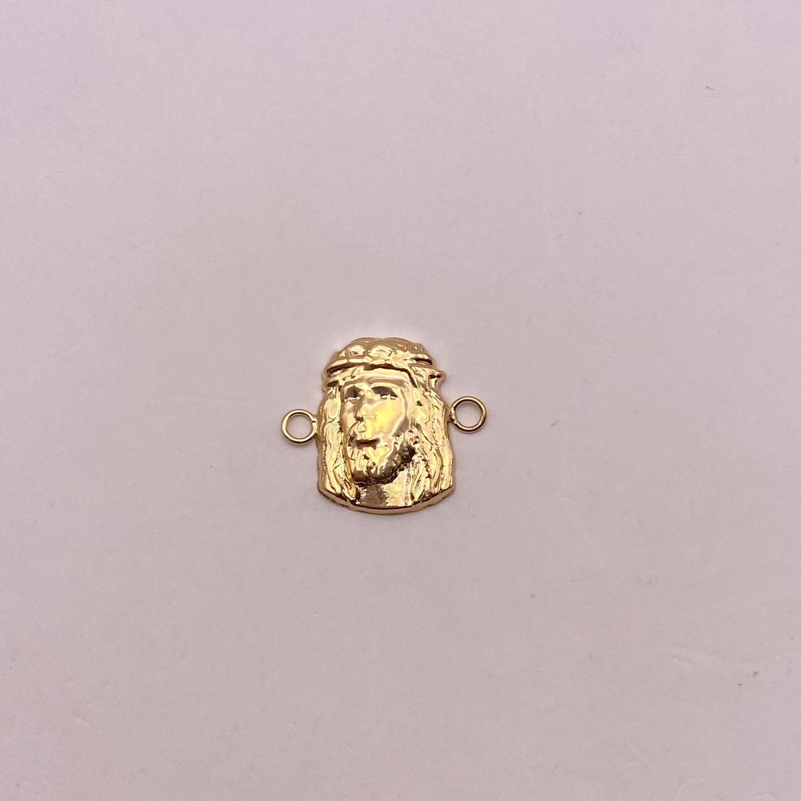 Herraje rostro jesus Oro amarillo 18k 0,87 Gr / 1,7 Cm