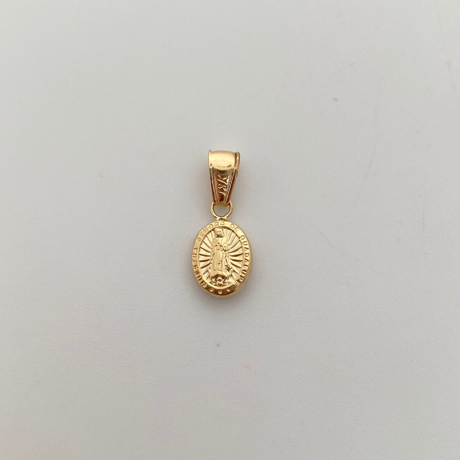 Dije Virgen de Guadalupe Oro amarillo 18k 0,5 Gr / 7,9 mm / 2 Cm