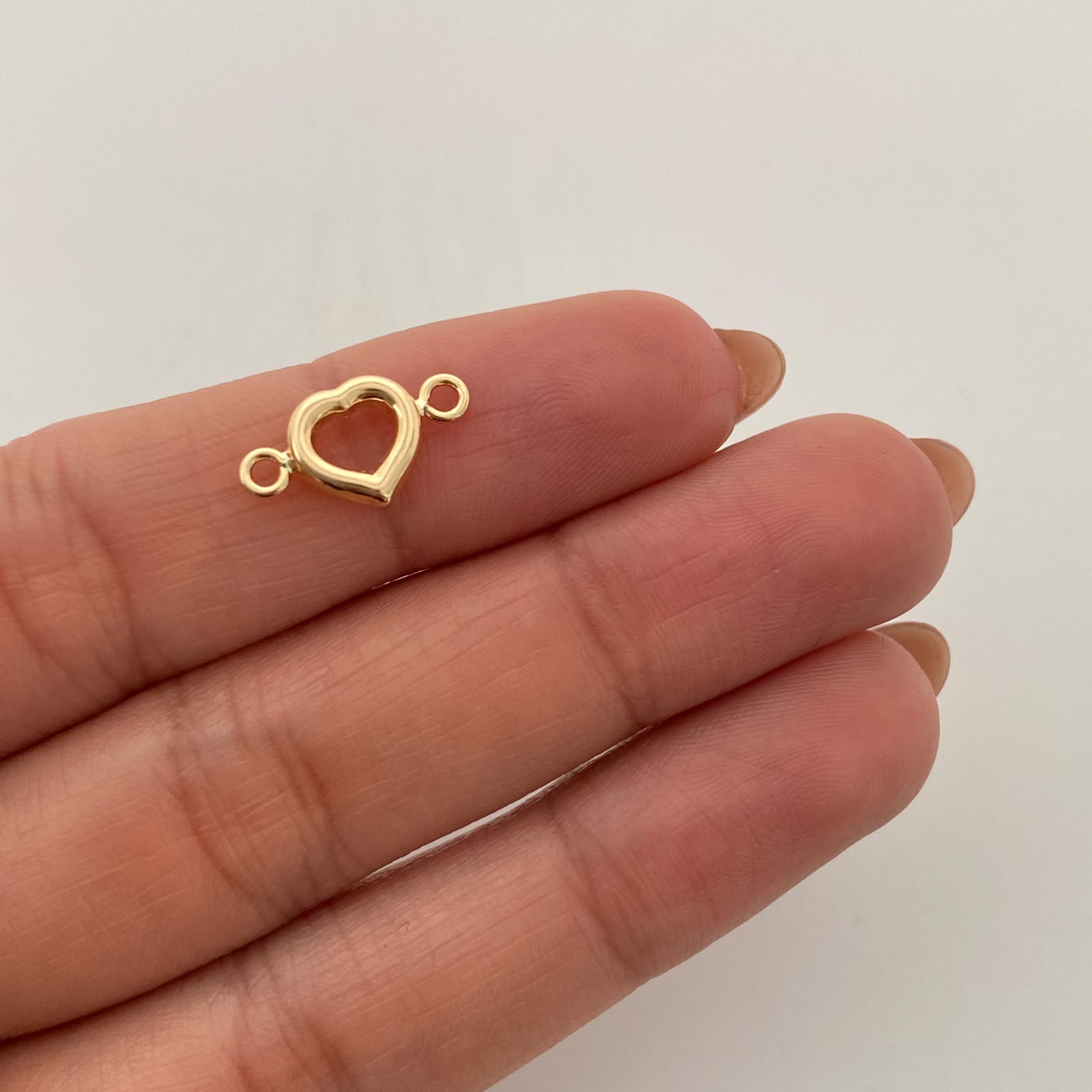 Herraje Corazon Silueta Oro amarillo 18k 0,4 Gr / 1,5 Cm