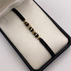Pulsera tejida Bolas diamantadas 6 y 5mm con neoros 6mm tres rayas y neoro 6mm una raya Oro amarillo 18k 0,4 Gr