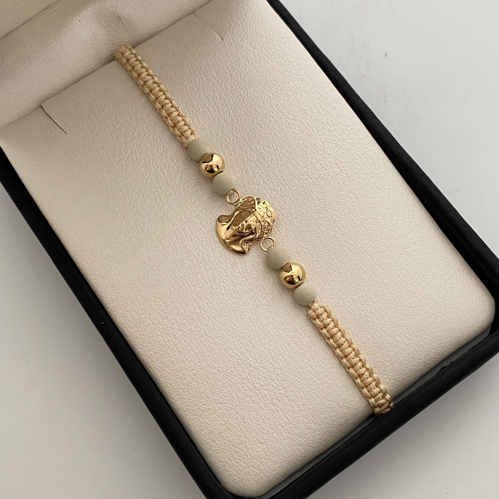 Pulsera tejida Rostro de jesus bolas lisas 5mm Beige Oro amarillo 18k 0,9 Gr
