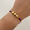 Pulsera tejida Seleccion Colombia balines lisos #8 Oro amarillo 18k 1,0 Gr