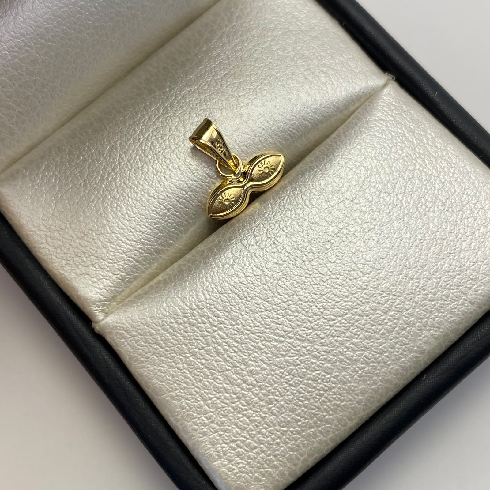 Dije Ojos de santa lucia Oro amarillo 18k 0,3 Gr / 10,8 mm / 1 Cm