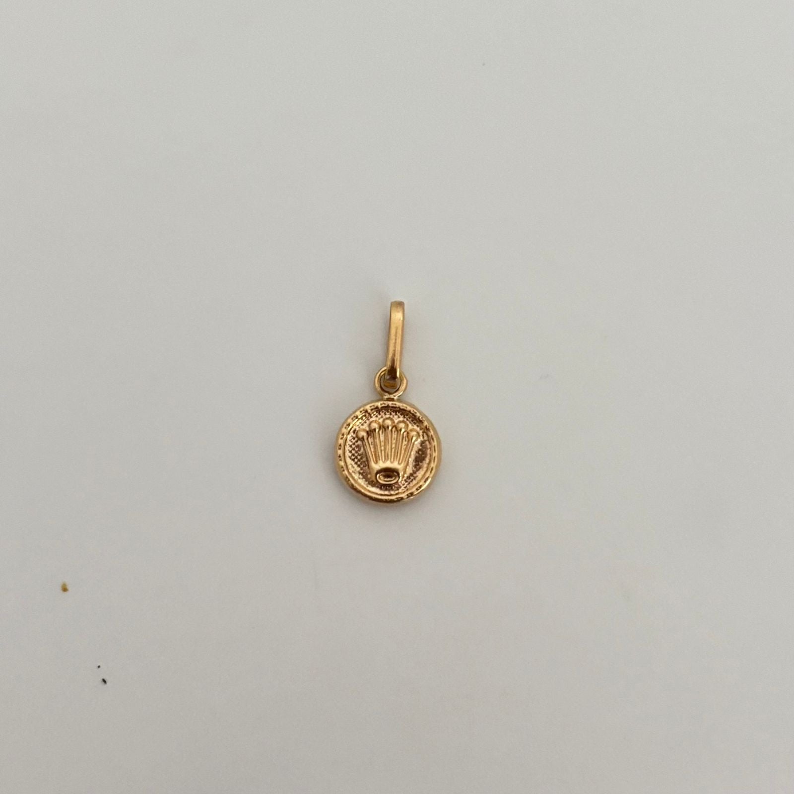 Dije troquelado corona rx Oro amarillo 18k 0,8 Gr / 2,2 Cm