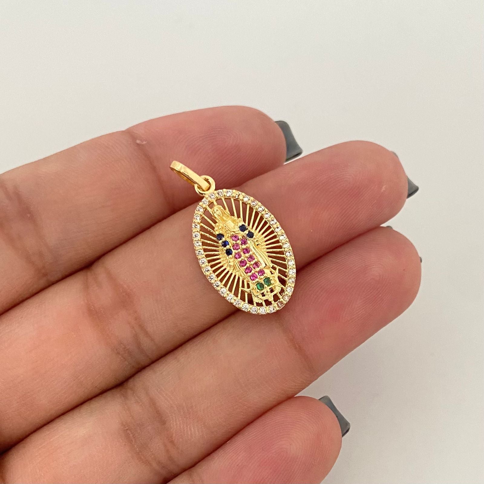 Dije silueta virgen guadalupe casting colores ovalada Oro amarillo 18k 2,0 Gr / 1,8 Cm