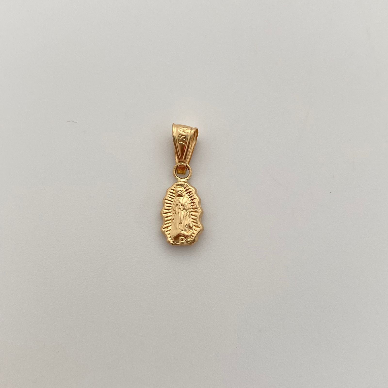 Dije Guadalupe Silueta Oro amarillo 18k 0,5 Gr / 6,5 mm / 1,8 Cm