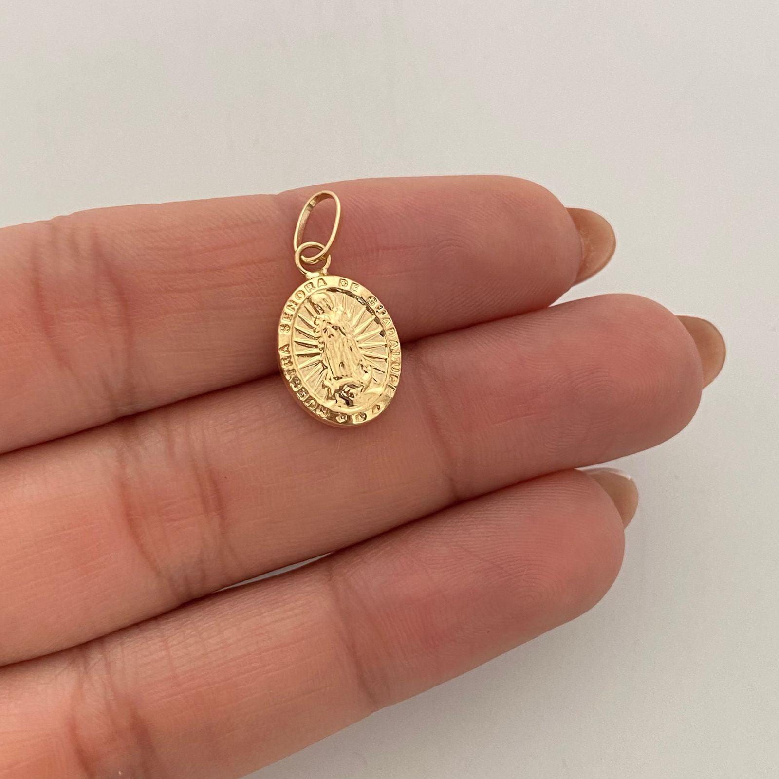 Dije virgen de guadalupe  Oro amarillo 18k 0,8 Gr / 10,58 mm / 2 Cm