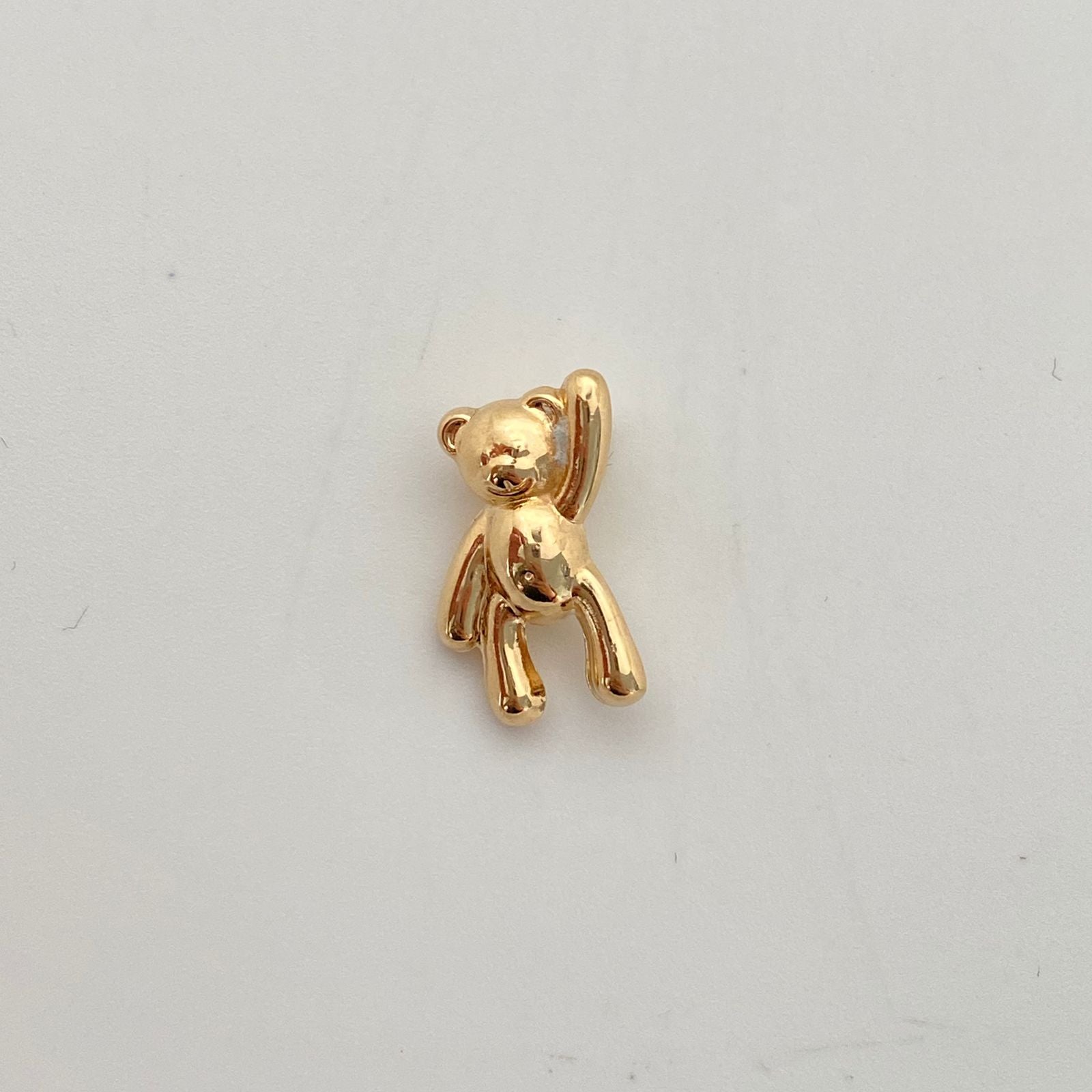 Dije oso mano alzada  Oro amarillo 18k 1,35 Gr / 11,1 mm / 1,5 Cm