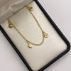 Tobillera aro seguido dijes Oro amarillo 18k 3,40 Gr / 27 Cm  Broche 0,40