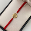 Pulsera tejida herraje corona rx oro amarillo 18k 0,95 gr