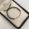 Pulsera tejida con balines diamantados 3mm  Tres oros 18k 0,75 Gr