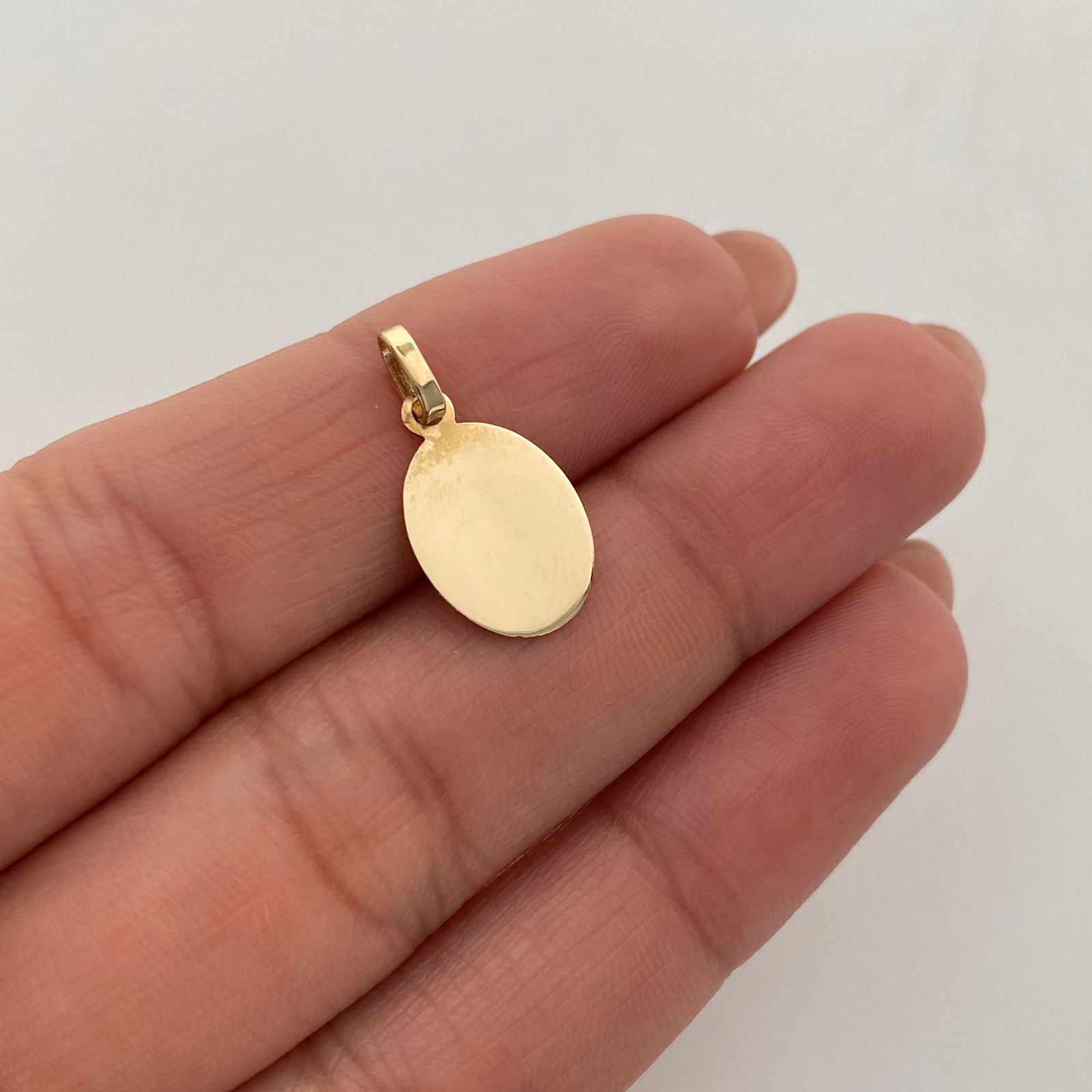 Dije Placa Ovalada Oro amarillo 18k 0,65 Gr / 9,8 mm / 2 Cm