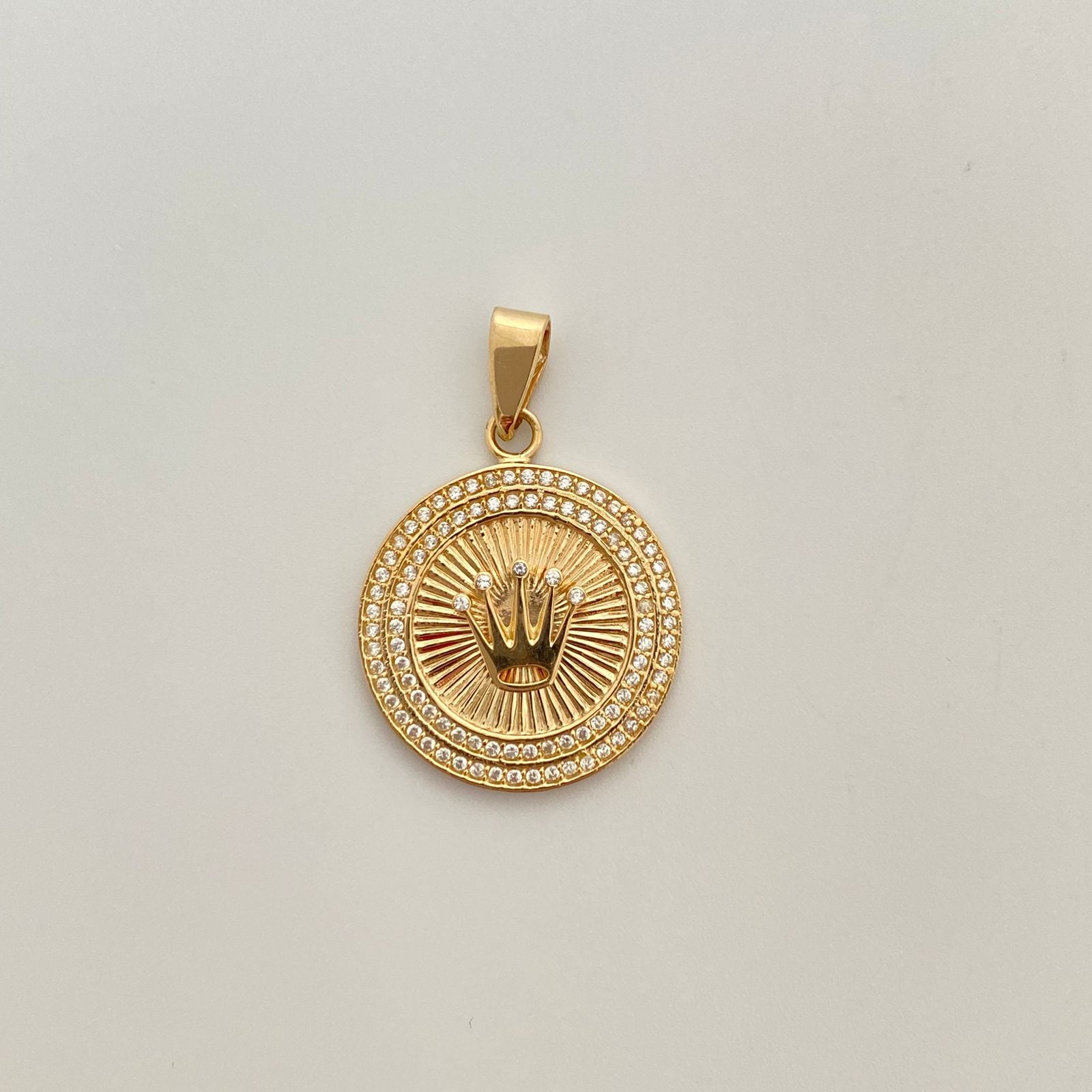 Dije corona rx con circones blancos Oro amarillo 18k 5,55 Gr / 22,25 mm / 3,1 Cm