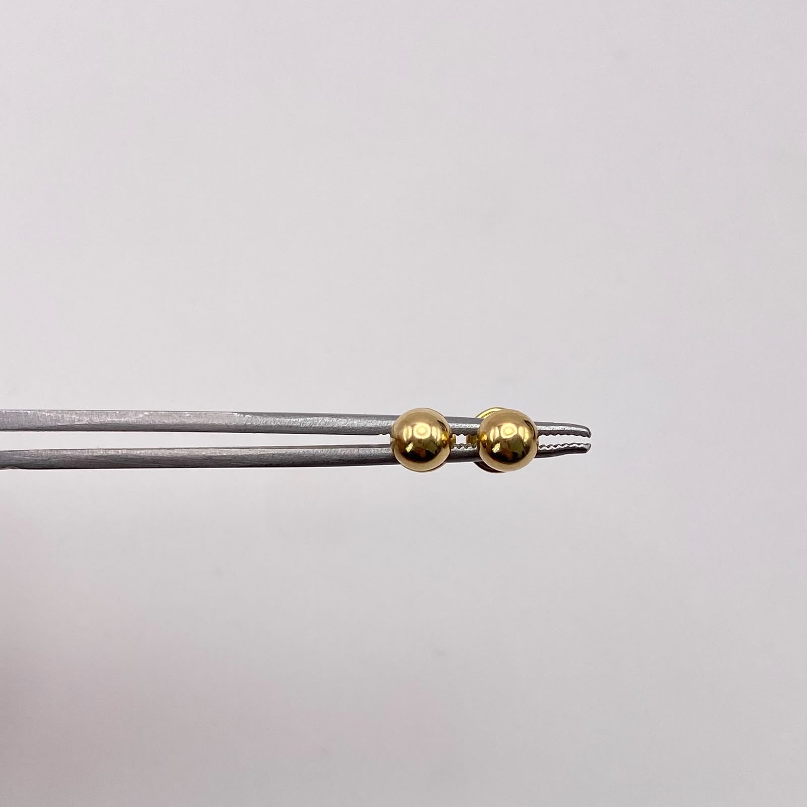 Topos bola lisa 5mm Oro amarillo 18k 0,55 Gr