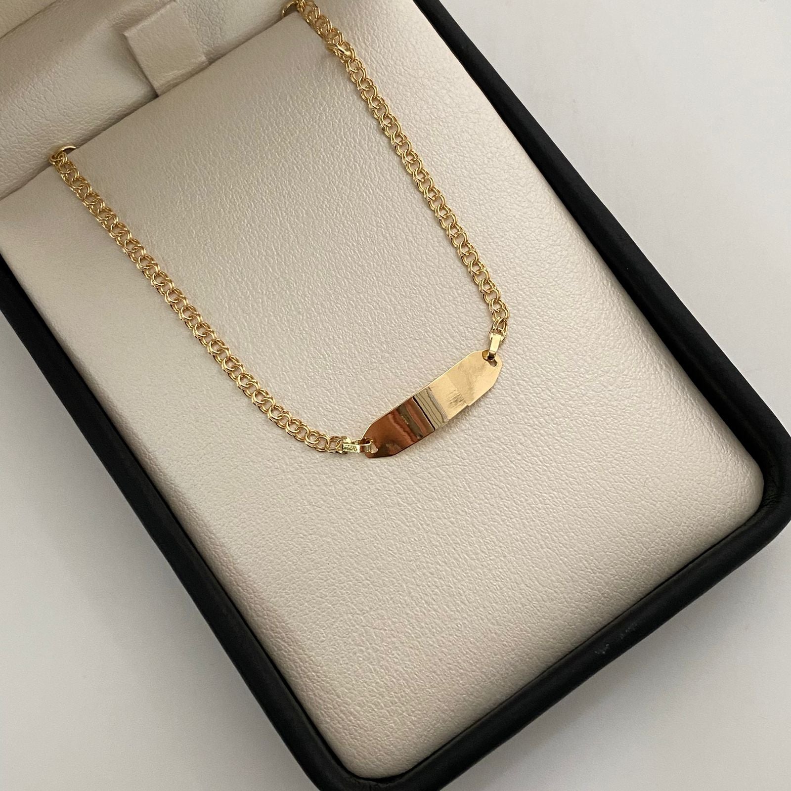 Pulso bebé aro seguido placa semi rectangular  Oro amarillo 18k 1,45 Gr / 5,3 mm / 15 Cm Broche 0,15