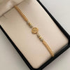 Pulsera tejida Virgen Guadalupe bolas diamantadas 4mm beige Oro amarillo 18k 0,6 Gr