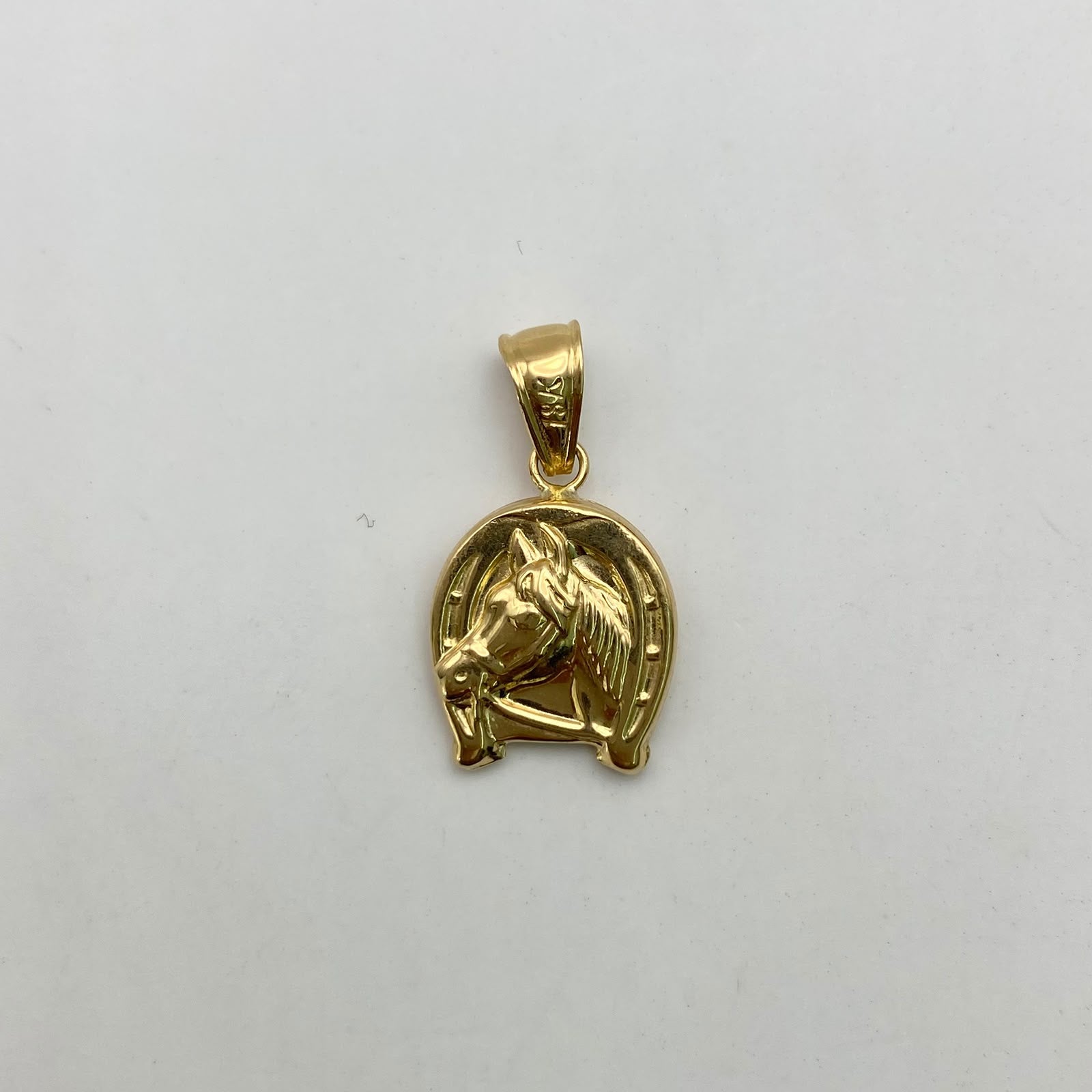 Dije herradura caballo Oro amarillo 18k 0,95 Gr / 12,4 mm / 2,5 Cm